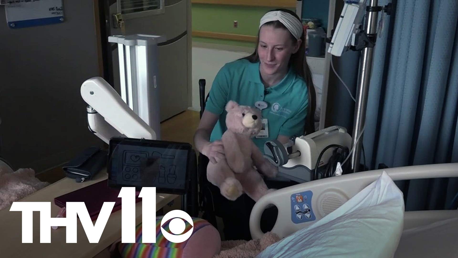 Bailey Hunter volunteers at Arkansas Children’s Hospital and uses a wheelchair made by the staff to make work less challenging.