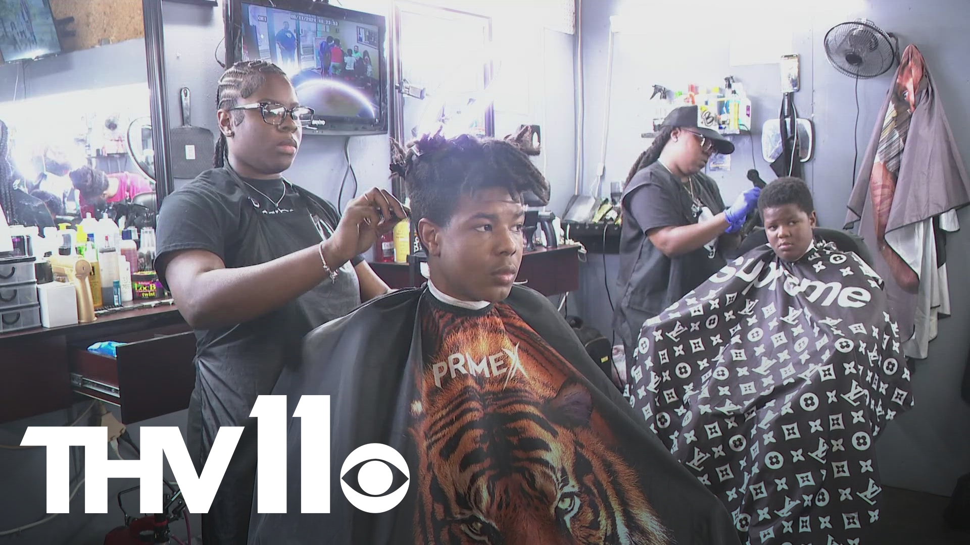 As kids prepare to go back to school, one Little Rock barbershop hosted an event focused on giving back to them and to the community.