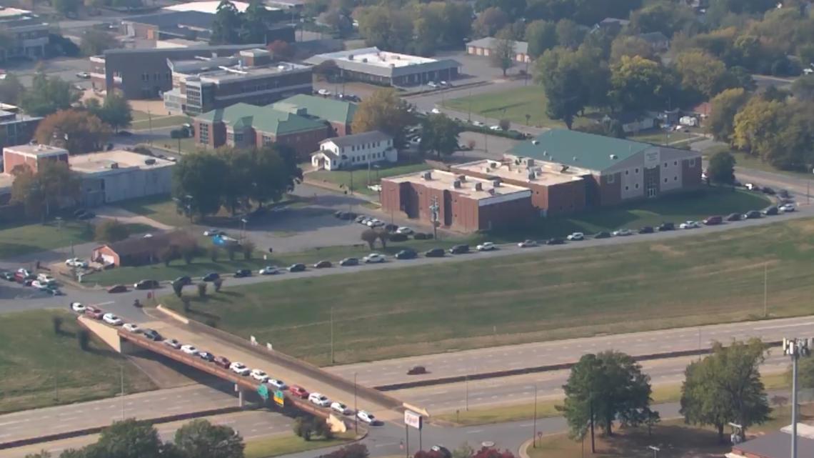 Long car line in Little Rock for annual pre-Thanksgiving giveaway