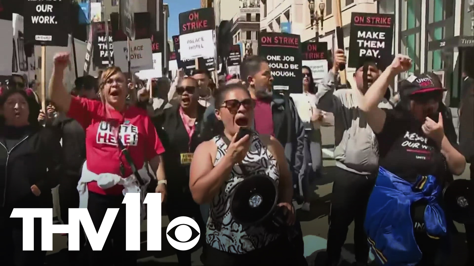 More than 10,000 hotel workers are on strike, demanding higher wages and the return of jobs cut during the pandemic.