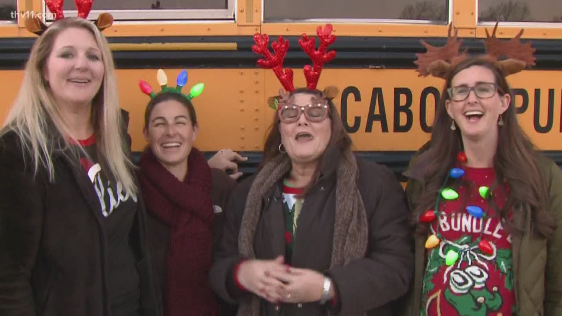 A group of Cabot teachers loaded up a couple of school buses and hit of the busiest Cabot neighborhoods to sing Christmas carols to students and their families.