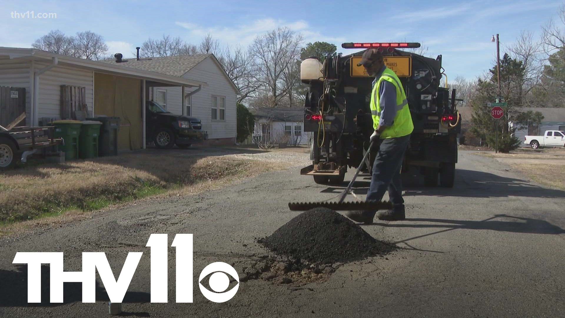 With the weather in Arkansas fluctuating from winter storms to sub-70 degree days, crews are noticing more and more potholes as a result.
