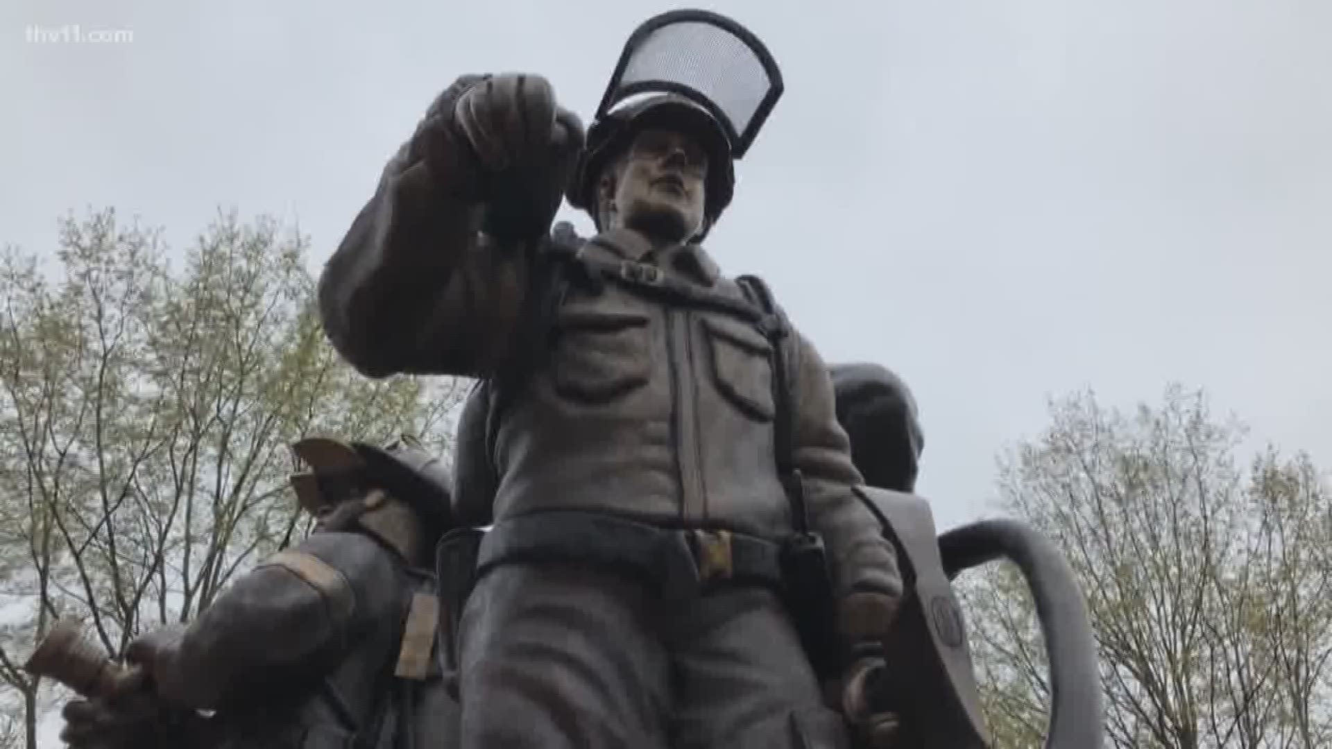 Despite the rain this afternoon, a large crowd gathered outside the State Capitol to honor Arkansas's fallen firefighters.