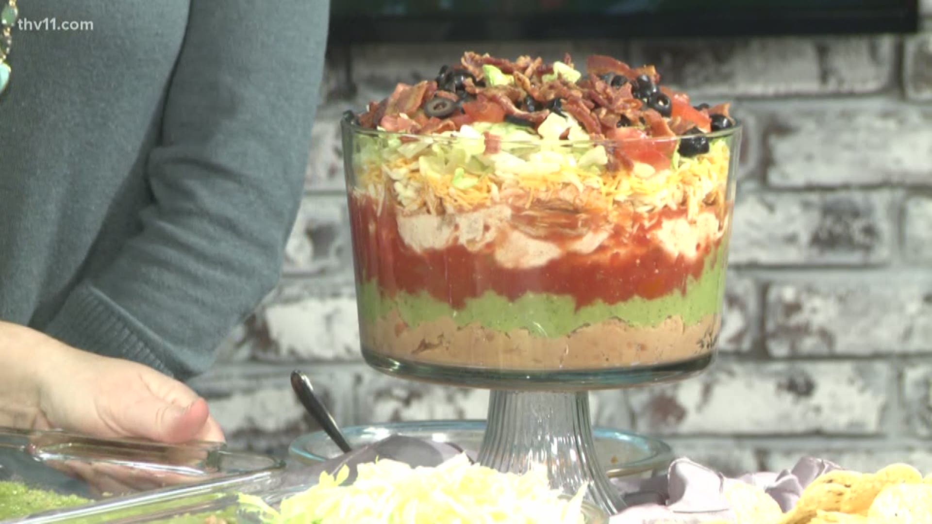 This seven-layer dip is a hassle-free way to feed your Super Bowl-watching crowd.