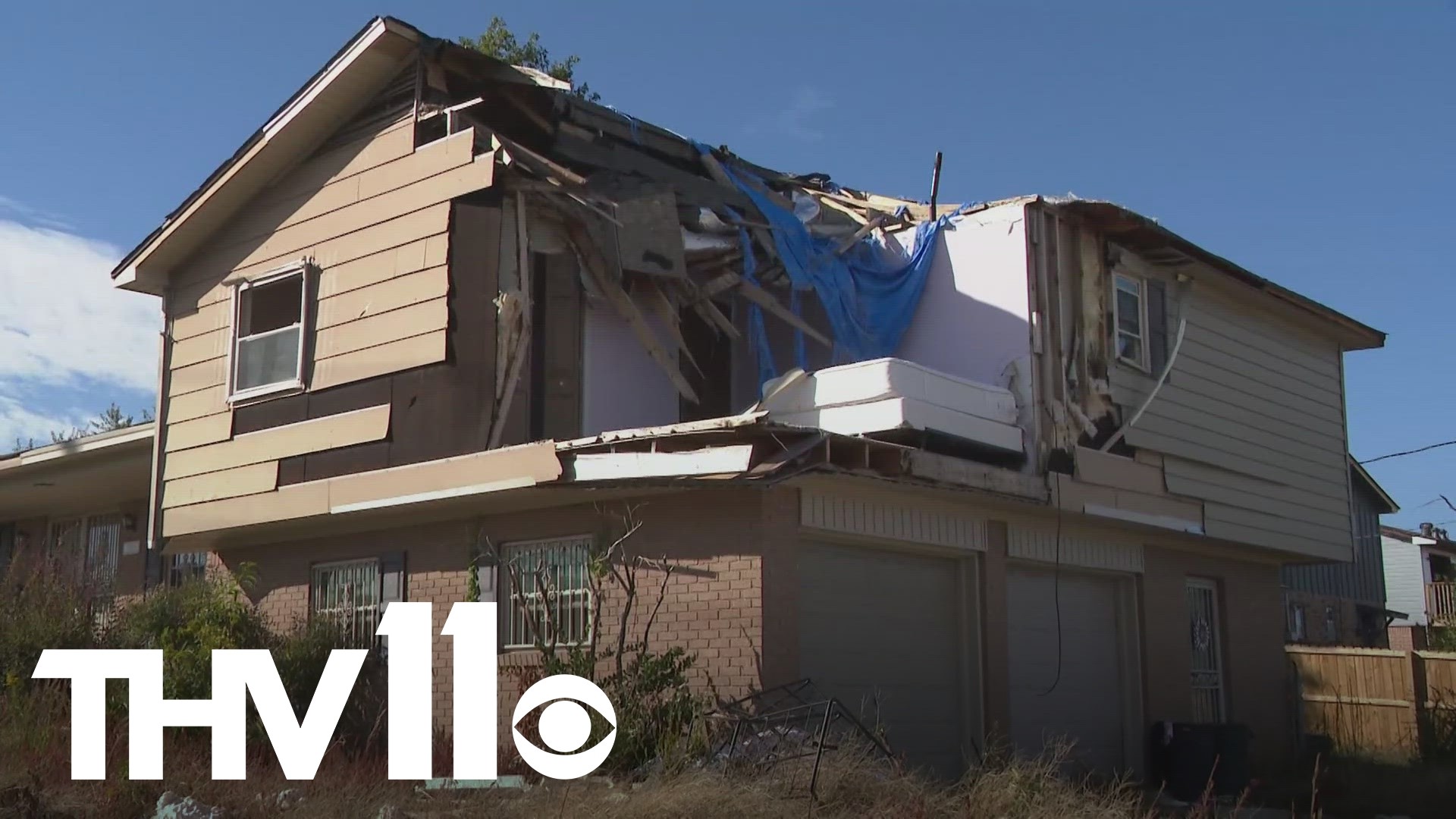 Several houses in Little Rock's Walnut Valley neighborhood are working to rebuild after two storms devastated the area, but some remain untouched.