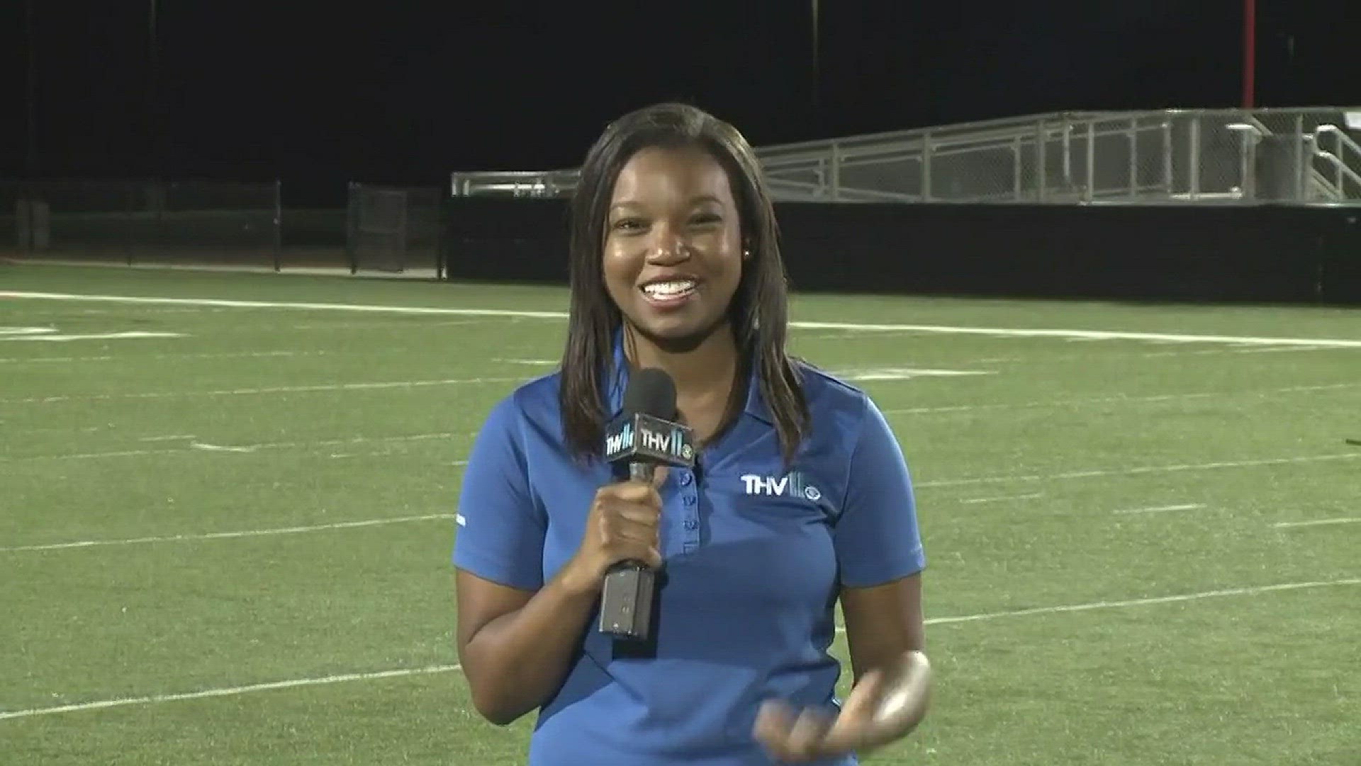 THV11's Raven Richard plays a joke on her co-anchors, Rob Evans & Amanda Jaeger while at Friday's 'Home Field Advantage' in Maumelle.