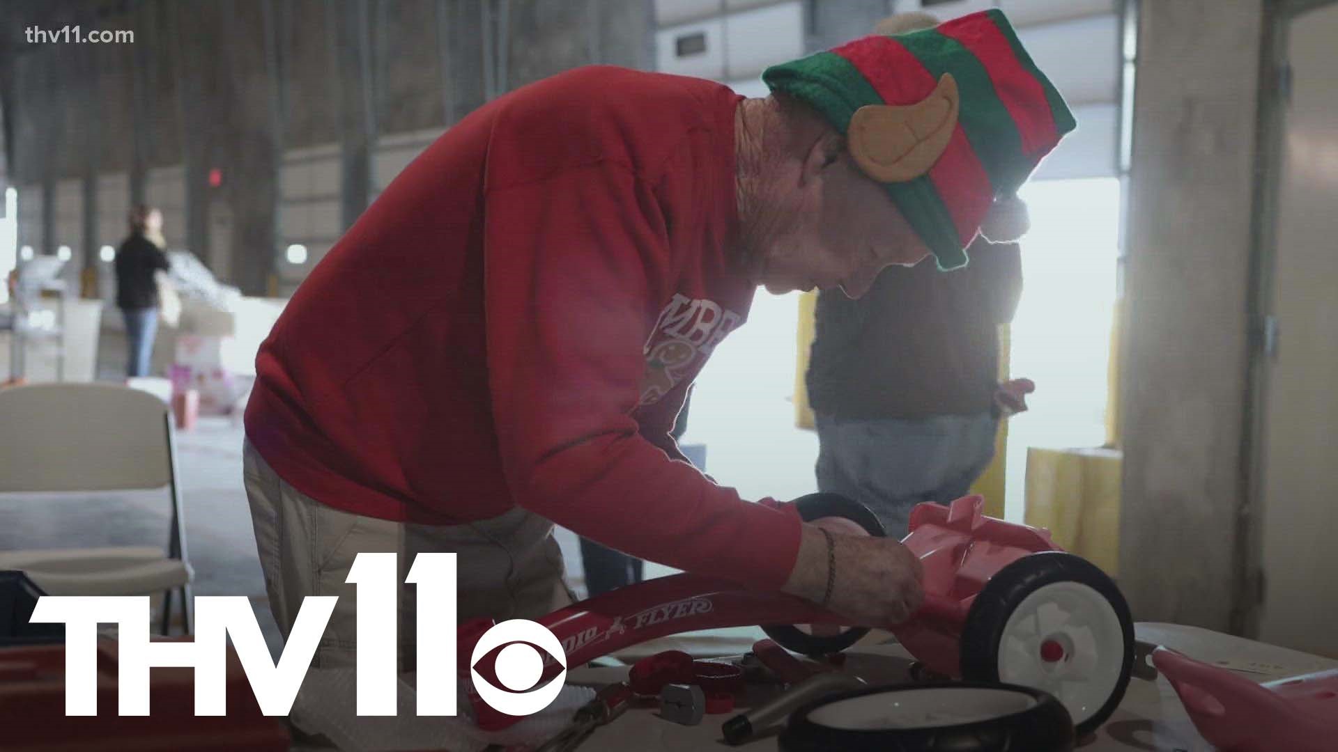 Volunteers at the Salvation Army work together at the Angel Tree Warehouse to bring Christmas gifts to thousands of children around Arkansas.