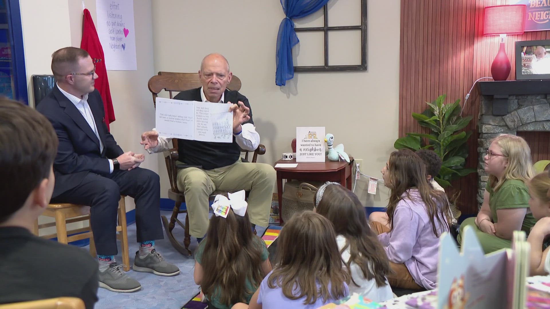 Meteorologist Skot Covert joins Craig O'Neill on the Reading Roadtrip and introduces Hurricane Creek Elementary students to Bernie the One-Eyed Puppy.