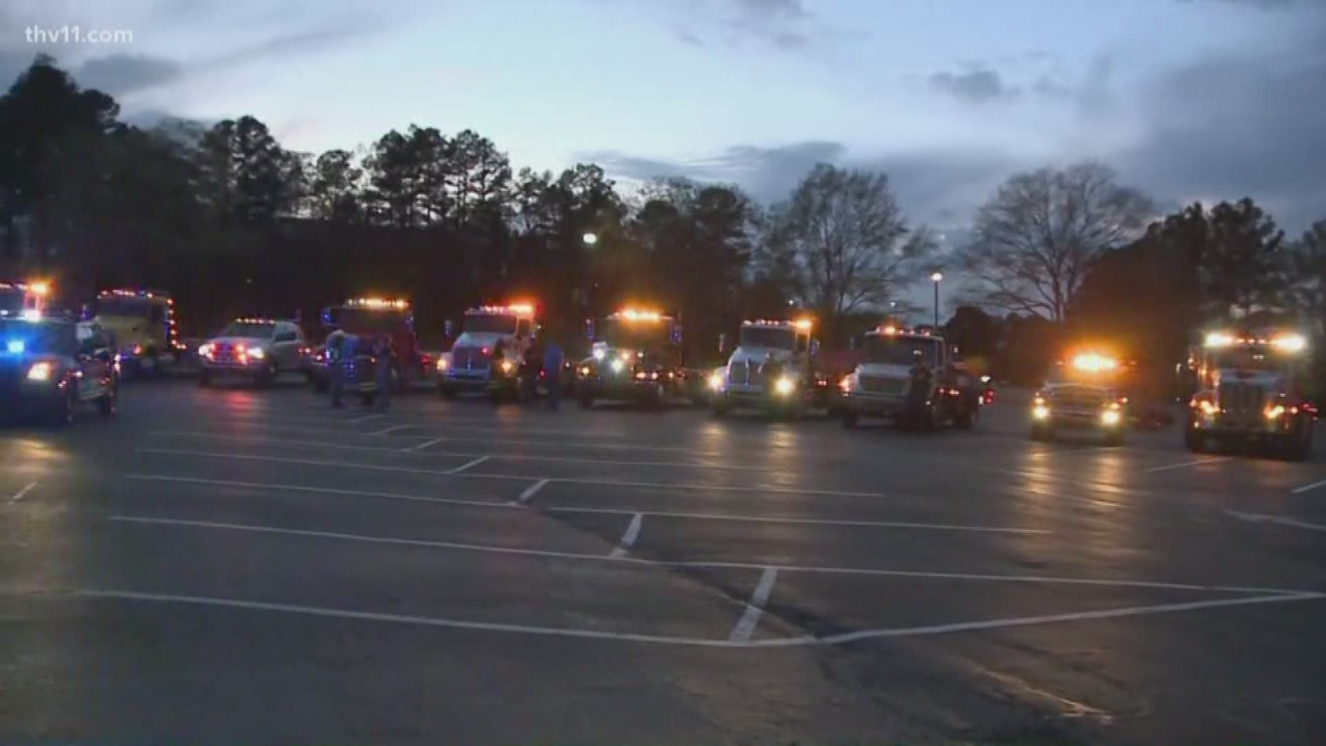 More than 30 tow truck drivers from all over Arkansas, along with law enforcement, gathered outside Baptist Hospital in Little Rock.