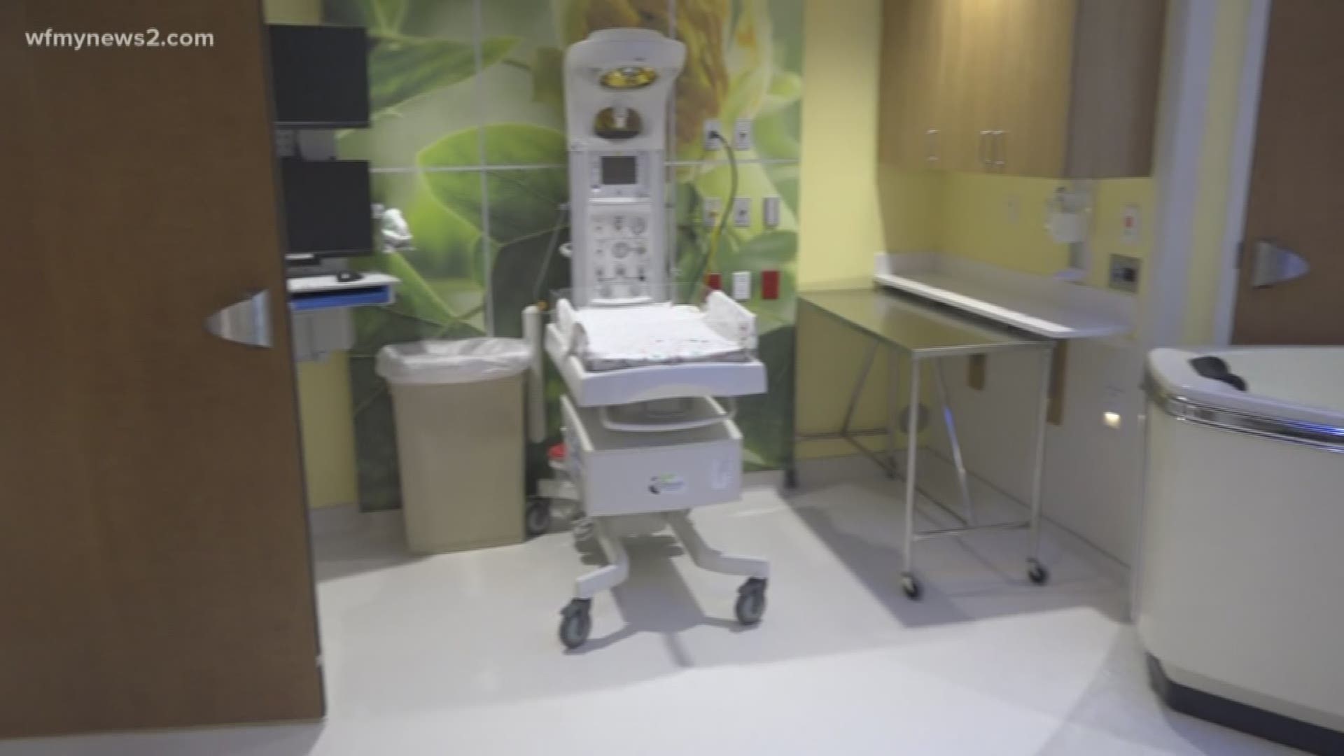 Cone Health Women's and Children's Hospital at Moses Cone cuts the