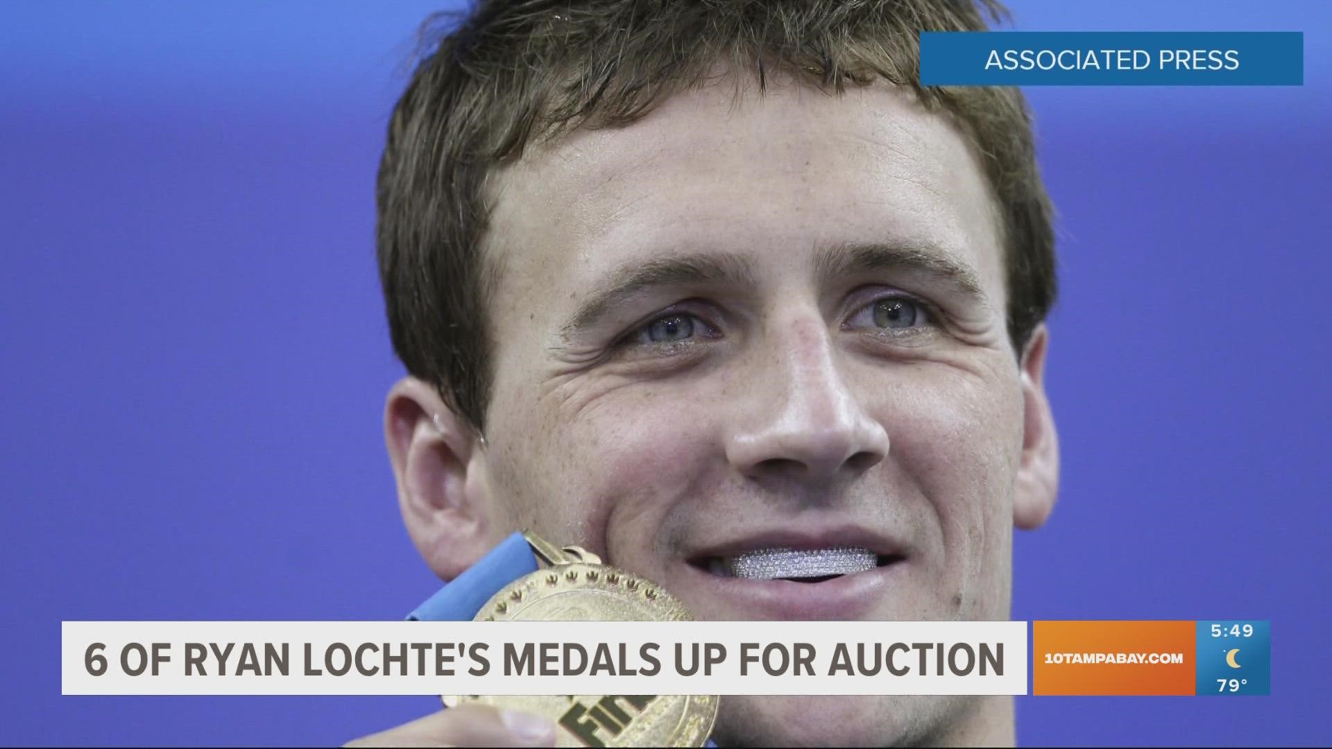 The 37-year-old swimmer earned 12 medals over four Olympics, including six gold that he plans to keep for now.