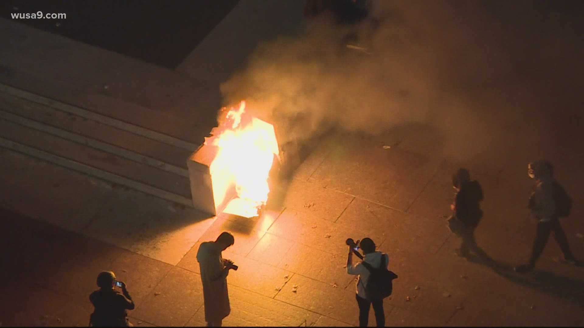 Amid clashes, flag burning and fireworks, one man was also stabbed.